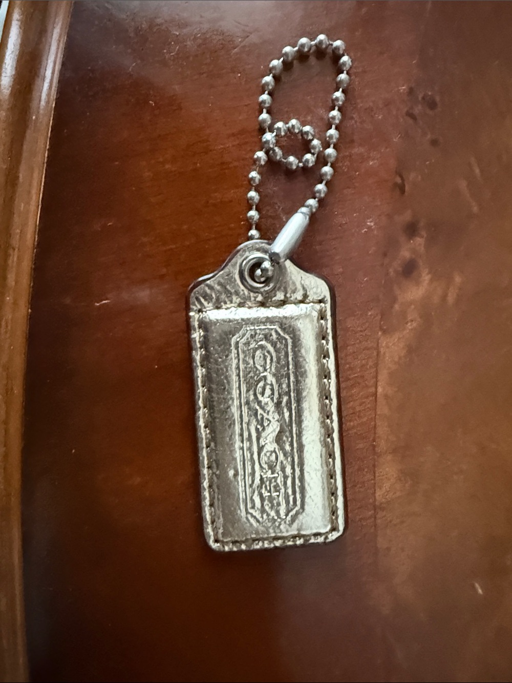 Coach Metallic Silver Leather Tag Keychain